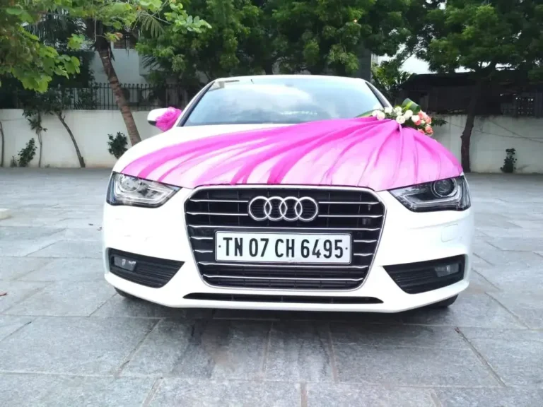 White Audi A4 decorated for a wedding in Chennai