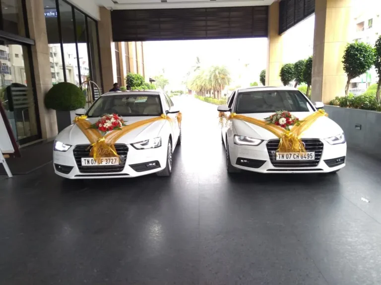 White Audi A4 wedding cars at a venue in Chennai