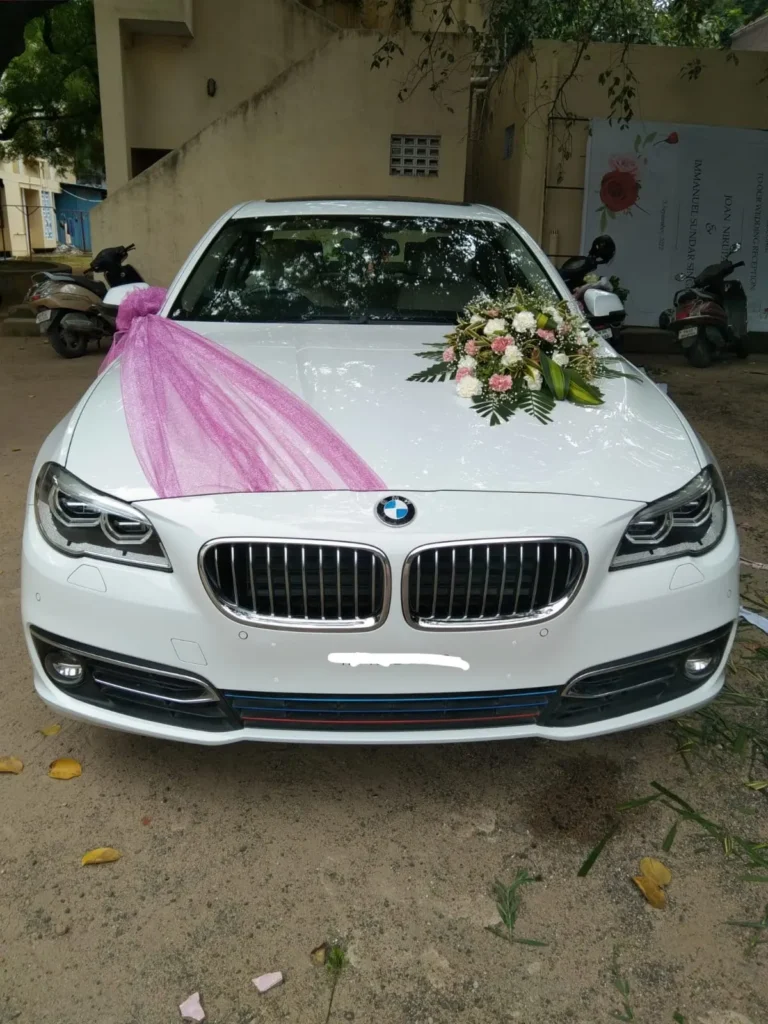 White BMW 5 Series decorated for a wedding - Sri Ram Cars Chennai