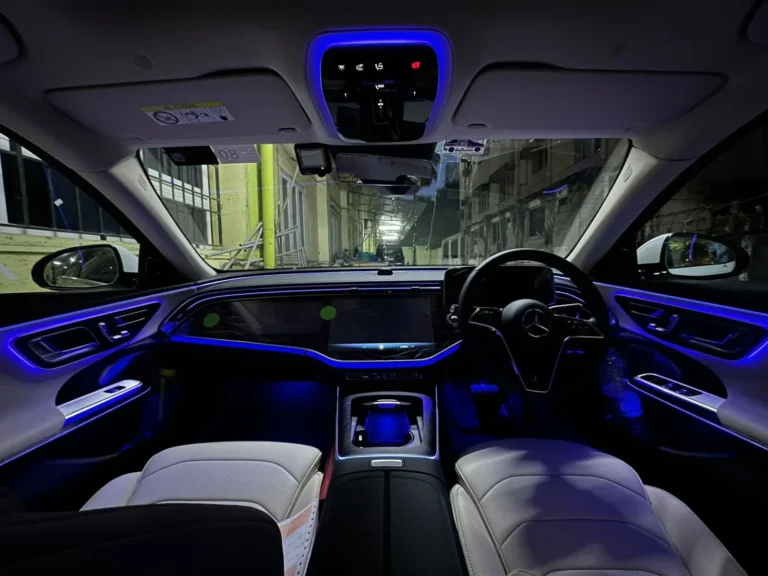 Mercedes-Benz E-Class interior with ambient lighting