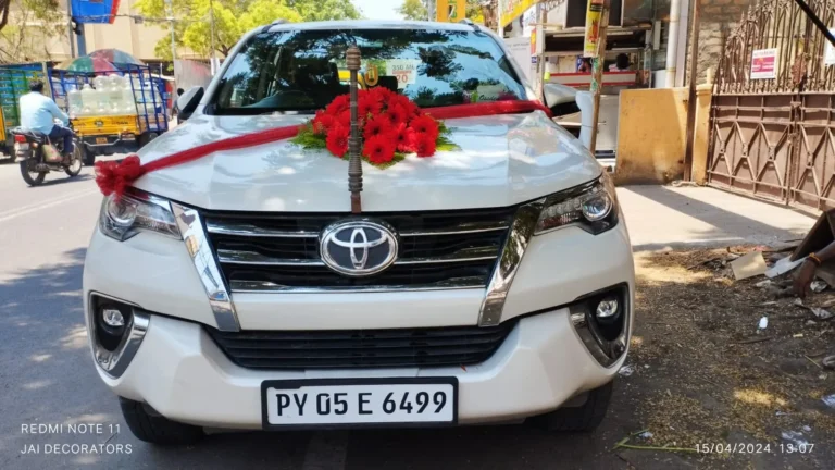 White Toyota Fortuner decorated for a wedding in Chennai