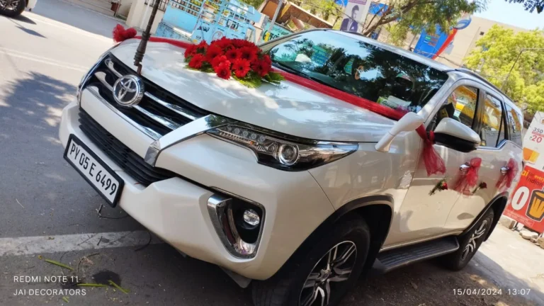 White Toyota Fortuner decorated for a wedding in Chennai